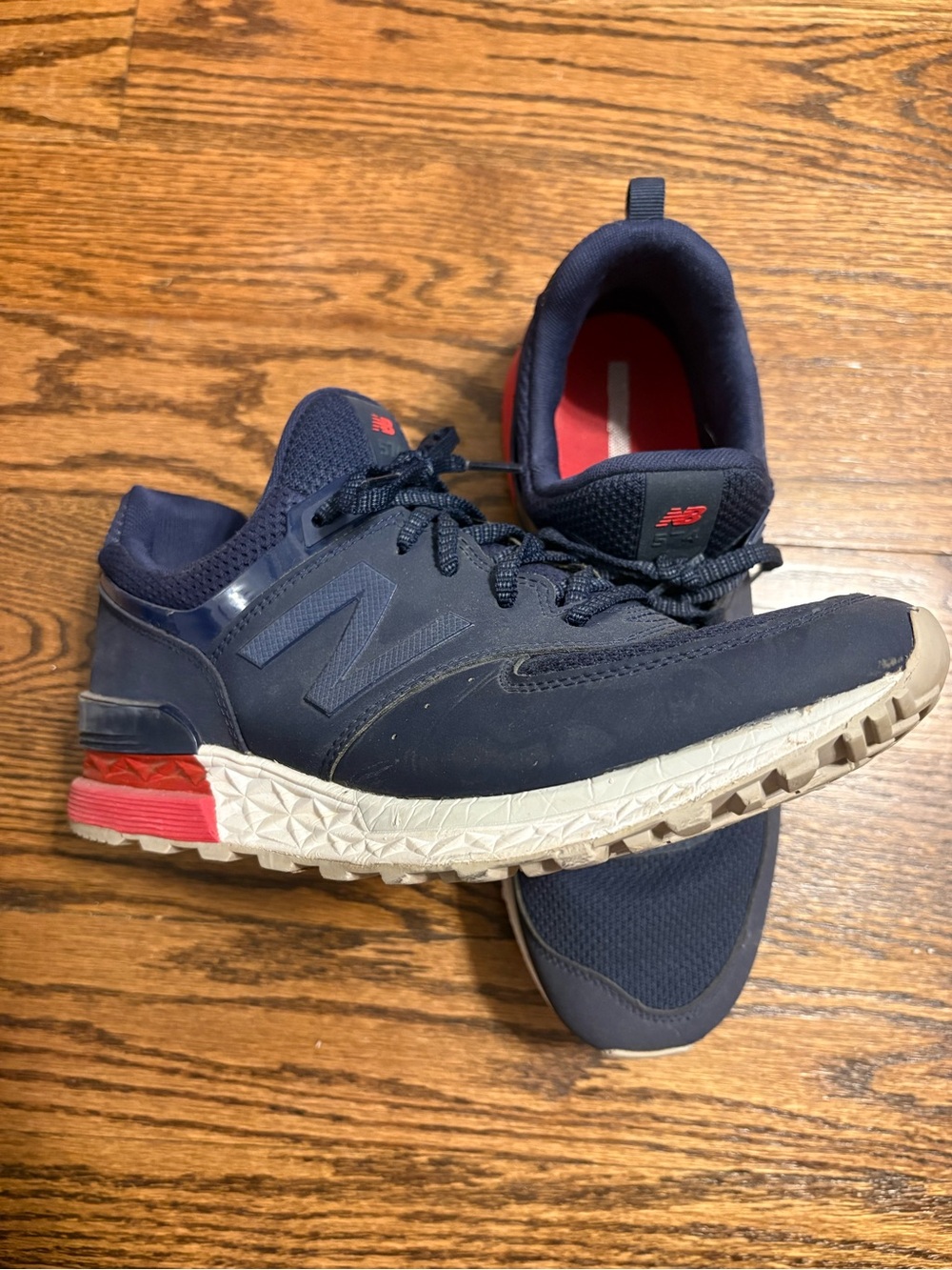 New Balance Men's Navy Sneakers with Red Accents